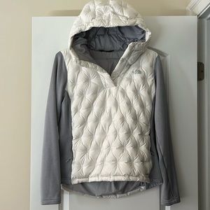 The North Face white puffer jacket with pockets